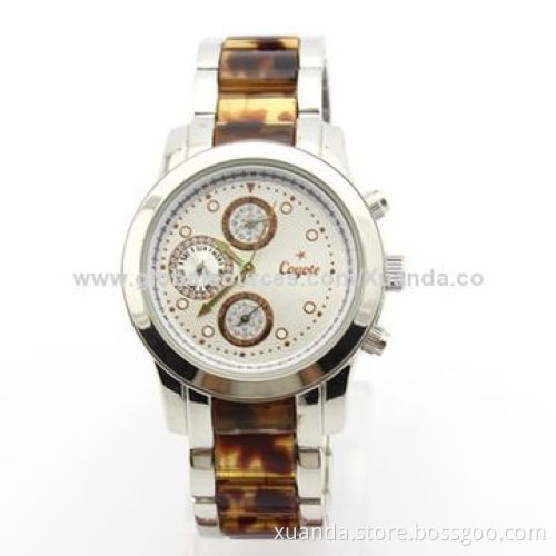 Football star wristwatch with power function, resin and metal match strap, metal case